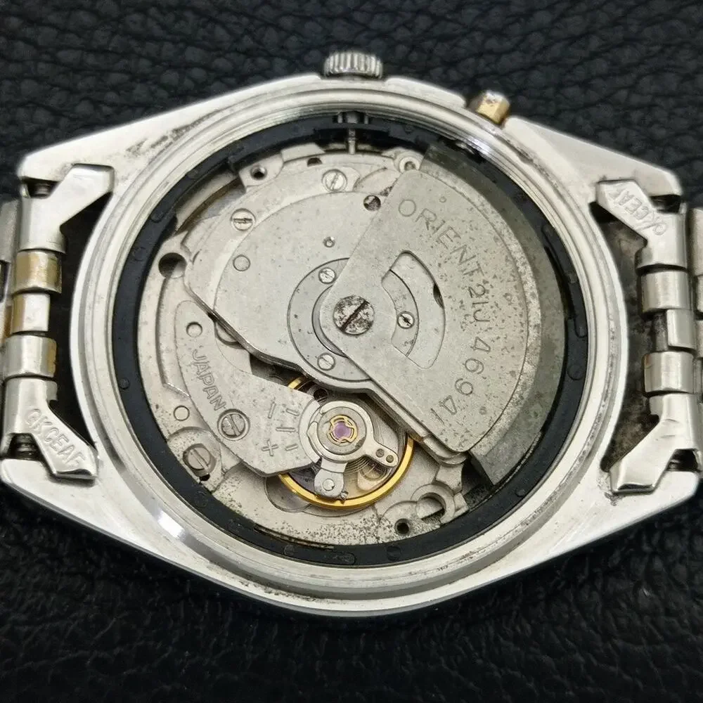 Vintage 1976 Orient Automatic Mens Silver Watch W/daydate & Silver accents